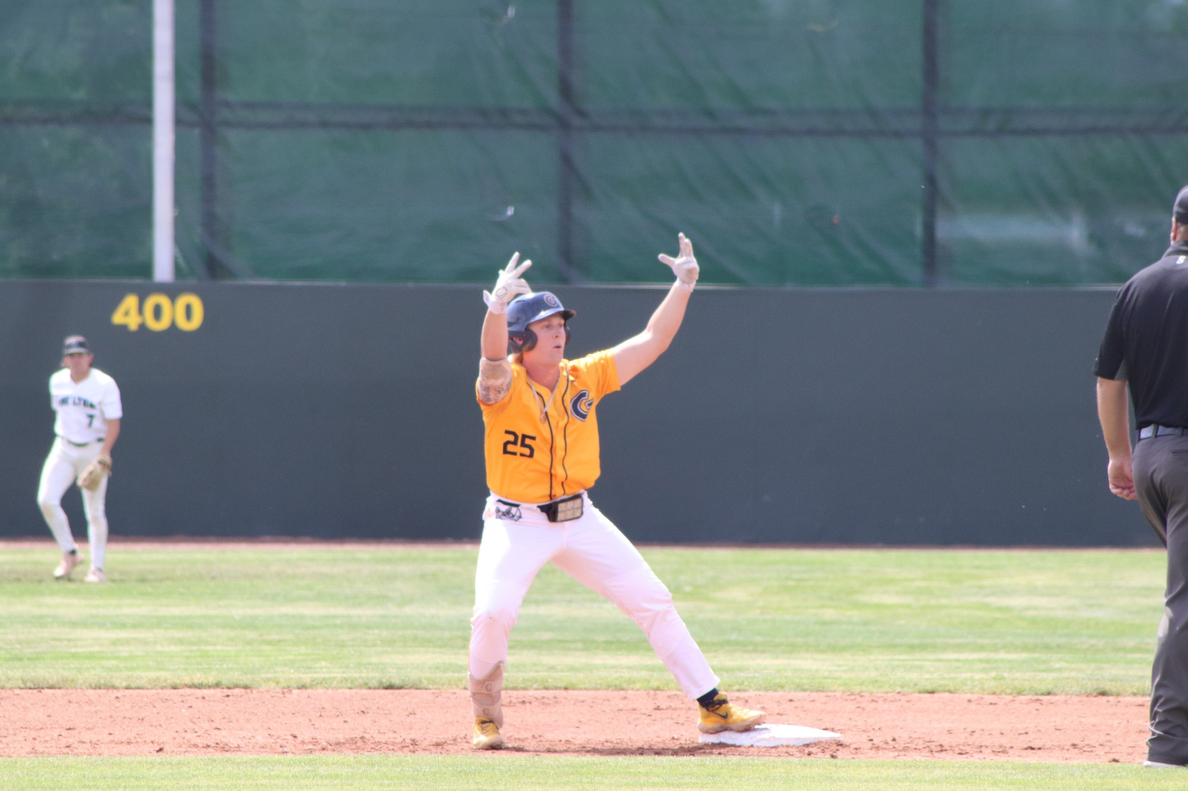 Gaston College's Preston Hall celebrates one of his four hits in Tuesday's NJCAA World Series victory in Grand Junction, Col.