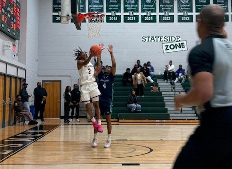 Gaston College's E.J. Joyner driving to the basket for two of his game-high 27 points in Saturday's Region 10 title game.