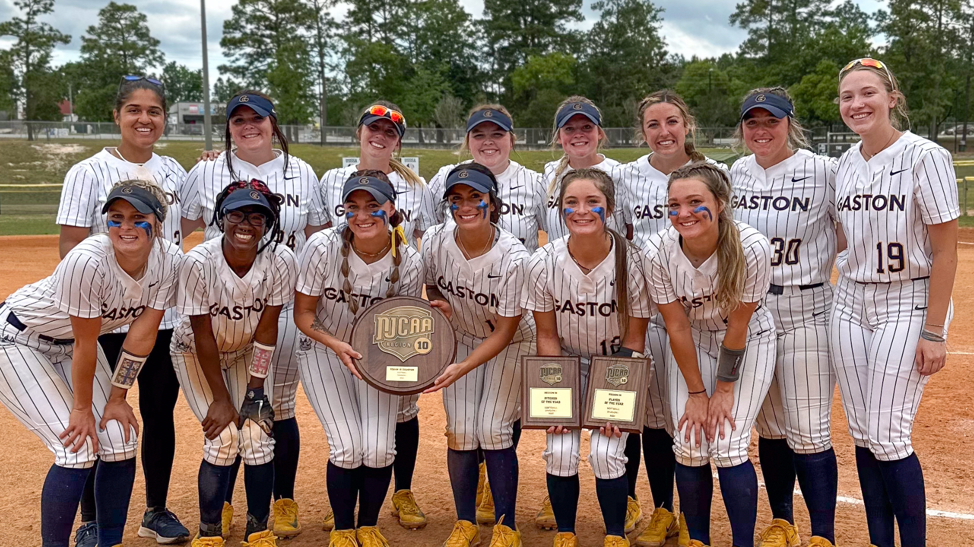Gaston College won region and district titles in its first-ever softball postseason trip. The Rhinos are shown here celebrating the Region 10 championship.