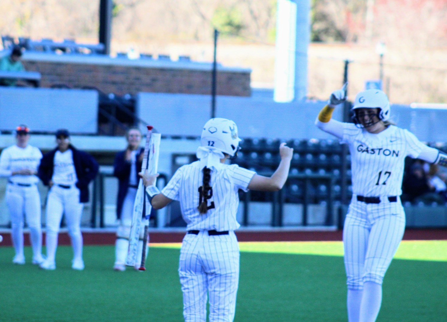 Gaston College's Asheton Queen, shown here celebrating a home run, was one of 7 Rhinos honored as Academic All-Americans.