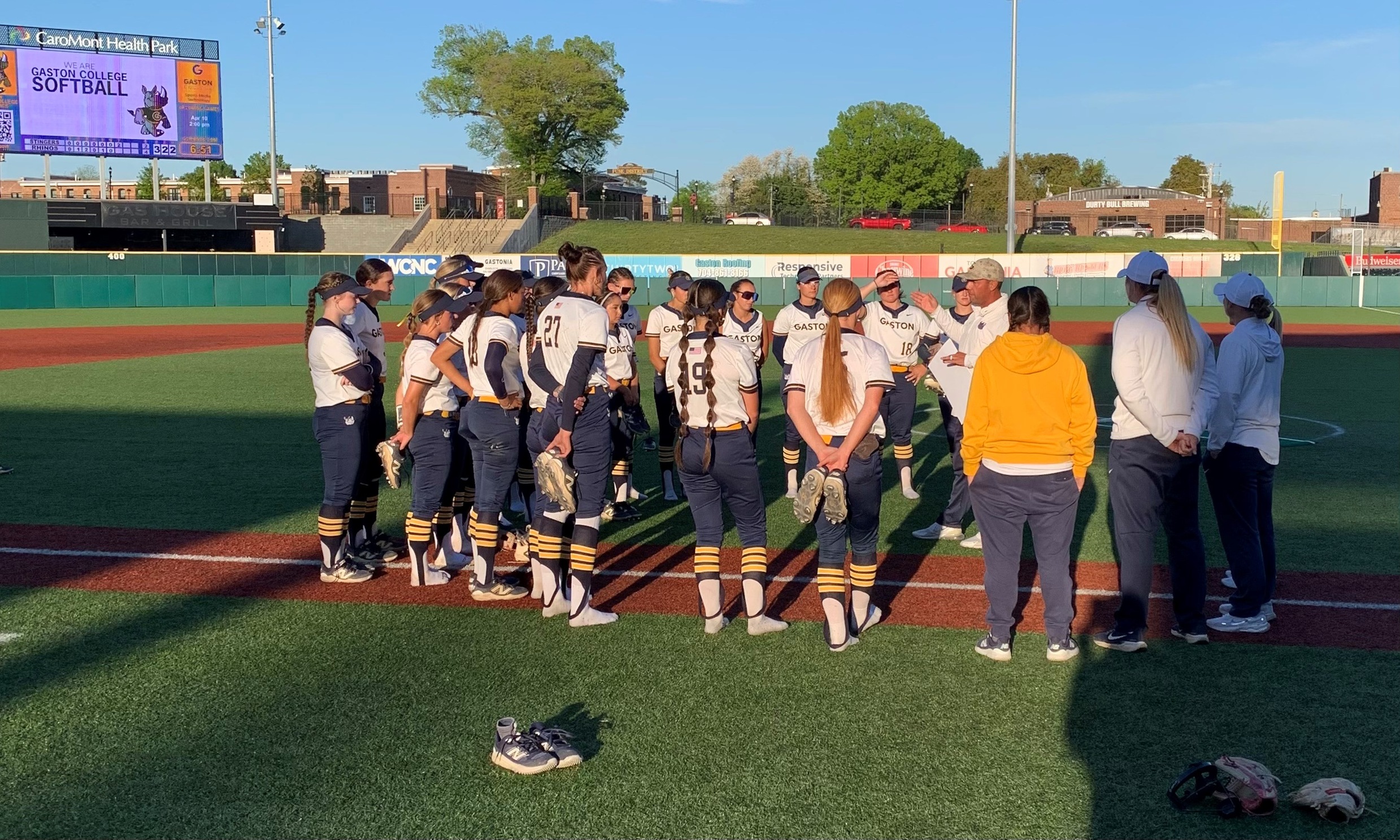 Gaston College's softball team meets after one of its 60 victories earlier this season.